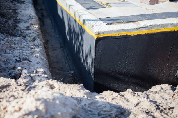 Professional Waterproofing technician working in Berea, SC